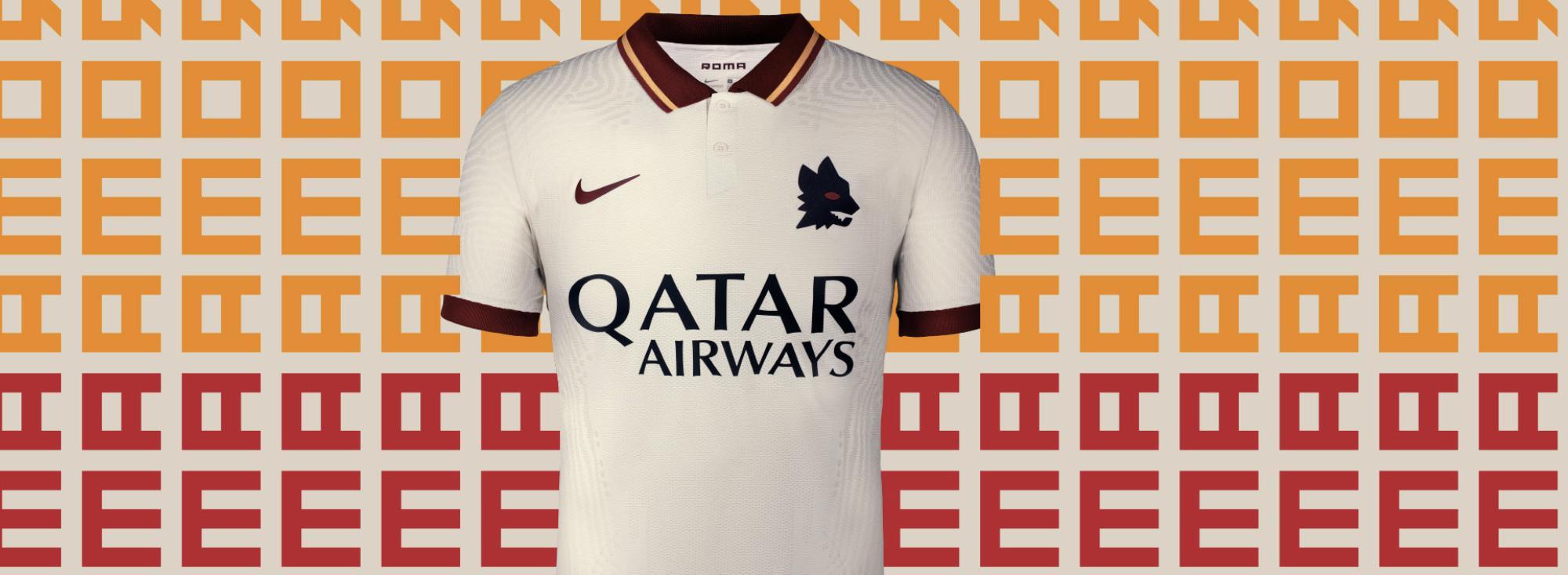 Roma, presentata la seconda maglia: bianco avorio, colletto rosso e lupetto di Gratton – FOTO